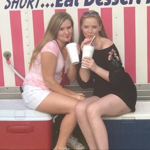 black romper with flower patches